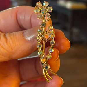 Vintage Aurora Borealis floral brooch prong set.